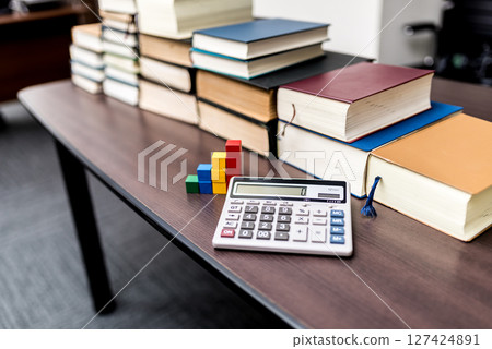 Calculator and book 127424891