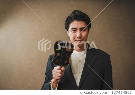 Businessman with a military flag 127424892