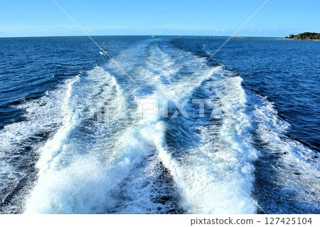 Beautiful sea and the wake of a high-speed boat Beautiful sea and the wake of a high-speed boat 127425104