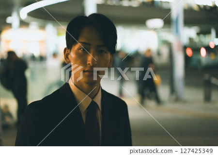 A salaryman hurrying home A salaryman hurrying home 127425349