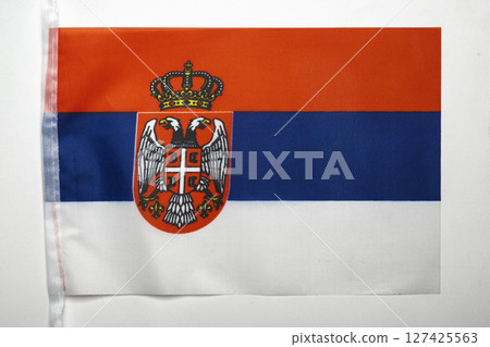 Closeup view of the Serbian Republic national flag isolated over a white background. Concept of government and nationality 127425563