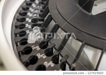 Equipment in the modern laboratory of the medicine factory. Sterile machine for medicine manufacture 127425603