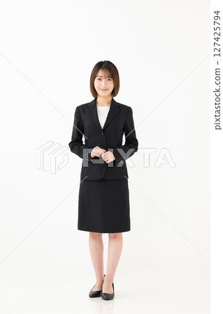 Woman in a suit Woman in a suit 127425794