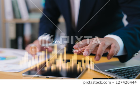 Business growth analysis, financial performance tracking, strategic future projections for market and success insights, Human interacts with a tablet dynamic holographic bar charts with percentages. 127426444