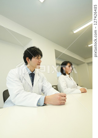 Medical staff having a meeting Medical staff having a meeting 127426485
