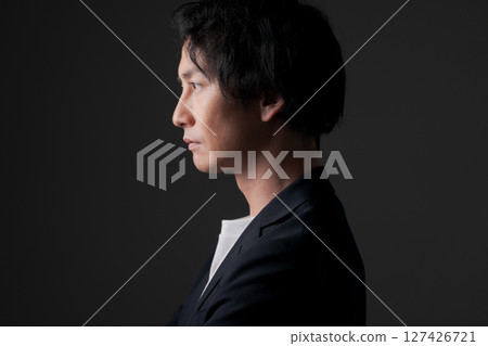 Profile of a young business person Profile of a young business person 127426721