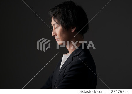 Profile of a young business person Profile of a young business person 127426724