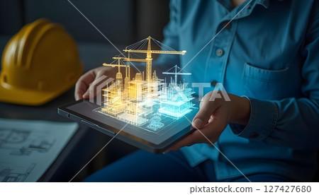 person holding tablet displaying futuristic construction project with holographic elements, showcasing innovation in architecture and engineering person holding tablet displaying futuristic construction project with holographic elements, showcasing innovation in architecture and engineering 127427680