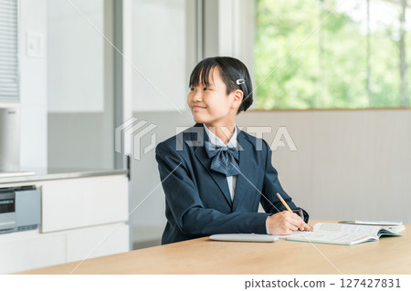 Junior high school and high school girls studying (homework, exam preparation, learning, education) 127427831