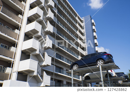 Mansion and multistory parking lot Mansion and multistory parking lot 127428862