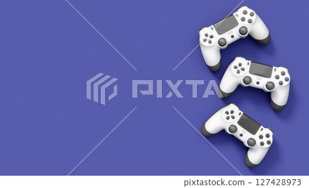 Realistic white video game joysticks or gamepads on violet background Realistic white video game joysticks or gamepads on violet background 127428973