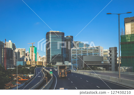 June 7 2025 Urban Highway with Skyscrapers and Modern Architecture in Daylight June 7 2025 Urban Highway with Skyscrapers and Modern Architecture in Daylight 127430210
