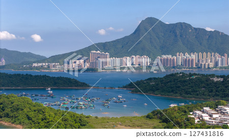 A vibrant panoramic view of a serene coastal harbor, 127431816