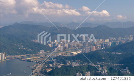 June 7 2021 Panoramic View of Cityscape Surrounded by Green Mountain 127431825