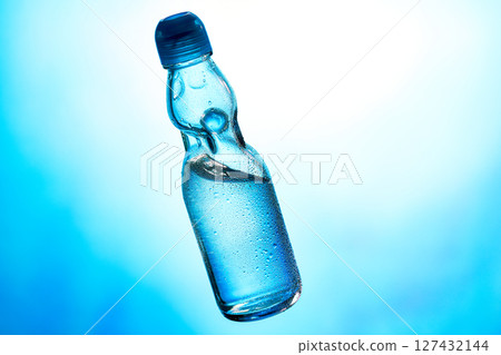 Chilled Ramune, traditional Japanese summer drink on blue background. 127432144