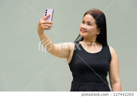 Portrait of Asian mature woman 127432203