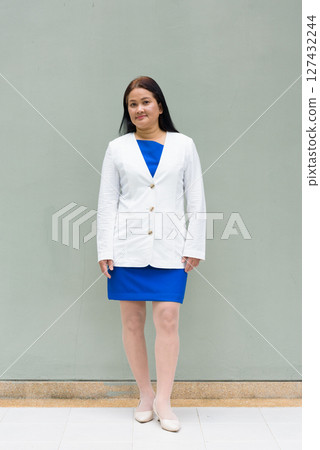 Full length portrait of mature Asian woman 127432244