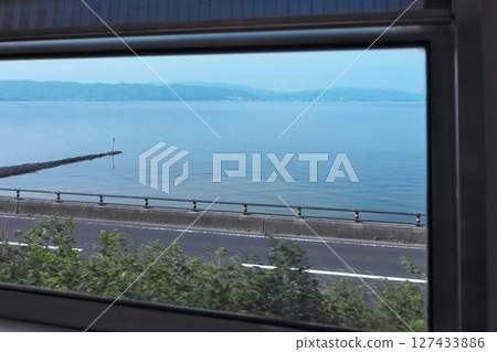 View of Lake Shinji from inside Ichibata Railway in Izumo City 127433886