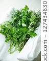 Various herbs wrapped in clean white cloth 127434630