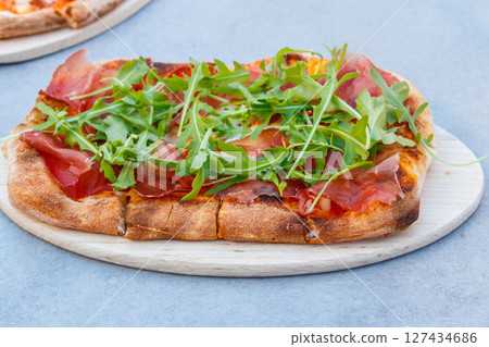 Tasty pinsa on a table 127434686