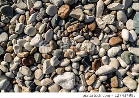 Smooth Beach Stones Collection A Natural Texture of Tranquility and Beauty on Shoreline 127434995