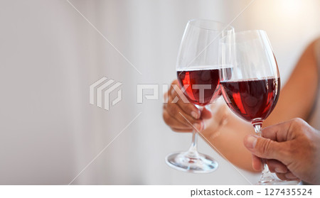 Wine glass, toast and celebration couple with mockup space for winery, hospitality or luxury industry marketing, advertising and promotion. Red wine, quality time and love people hands celebrate date 127435524