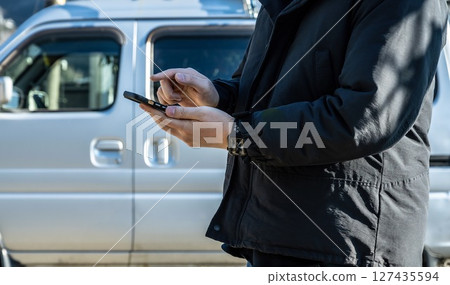 Working in a light van 127435594