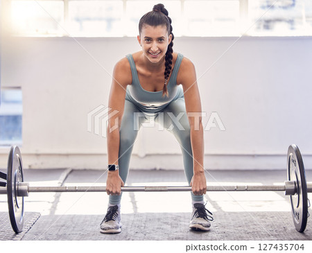 Fitness portrait, weightlifting or motivation for woman in gym for workout, exercise or heavy weight training. Happy, sports or athlete girl for health wellness or cardio in studio for sport goal Fitness portrait, weightlifting or motivation for woman in gym for workout, exercise or heavy weight training. Happy, sports or athlete girl for health wellness or cardio in studio for sport goal 127435704