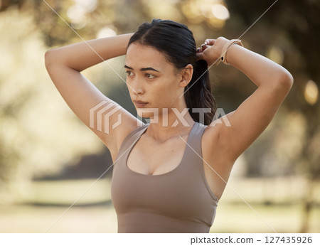 Woman, fitness and tie hair at park for exercise, workout or running in summer sunshine for health. Girl, runner and focus outdoor for wellness, training and ready for healthy, strong body and cardio Woman, fitness and tie hair at park for exercise, workout or running in summer sunshine for health. Girl, runner and focus outdoor for wellness, training and ready for healthy, strong body and cardio 127435926