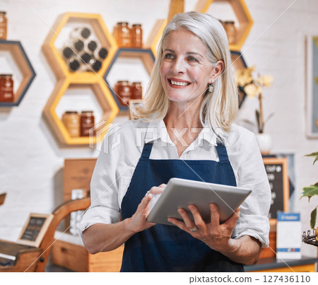 Small business owner, tablet and woman with sustainable, eco friendly and honey shop with recycle glass and e commerce marketing strategy idea. Online shop, website planning and food store manager 127436110