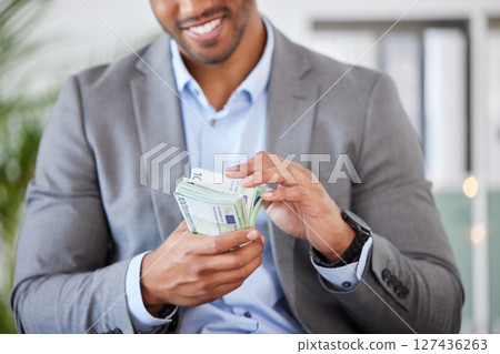 Hands, money and finance with a business man counting cash while accounting or banking in his office. Financial, investment and loan with a male employee working as an economy accountant for profit Hands, money and finance with a business man counting cash while accounting or banking in his office. Financial, investment and loan with a male employee working as an economy accountant for profit 127436263