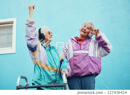Senior, music and disability with a woman friends outdoor in a city having fun together with a peace sign hand gesture. Freedom, retirement and happy with a mature female and friend bonding outside Senior, music and disability with a woman friends outdoor in a city having fun together with a peace sign hand gesture. Freedom, retirement and happy with a mature female and friend bonding outside 127436424