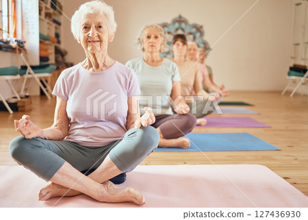 Yoga, exercise and senior woman in lotus for meditation, mindfulness and zen workout for health and wellness in retirement. Group of old people together yoga spiritual, chakra and balance training 127436930