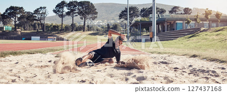 Athlete long jump, sand and sports man training for France olympic competition, workout challenge or fitness exercise. Winner mindset, commitment and athletics person working on leg power performance 127437168