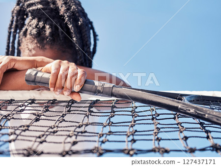 Tennis, sport fail and black woman sad after defeat at game or competition against a blue sky with depression, stress and anxiety. Burnout, tired and mental health of an athlete after loss or mistake 127437171
