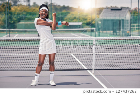 Stretching, tennis and sports woman with muscle wellness, body workout and training motivation, energy and happy portrait. Young black woman or african athlete in tennis court warm up for competition Stretching, tennis and sports woman with muscle wellness, body workout and training motivation, energy and happy portrait. Young black woman or african athlete in tennis court warm up for competition 127437262