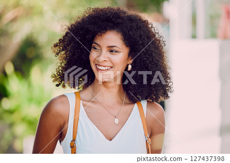 Woman, smile and happy with backpack for travel, holiday or walking in small town in Mexico. Female, bag and attractive happiness on face as tourist walk in city, afro or happiness and vacation 127437398
