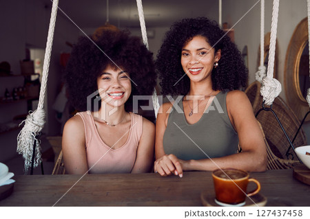 Friends portrait, happy and together at cafe for friendship, love and support. Black woman, relax and reunion happiness or relaxing quality time for relationship bonding with coffee at coffee shop 127437458