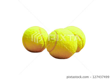 Three yellow tennis balls close together, isolated on white Three yellow tennis balls close together, isolated on white 127437499