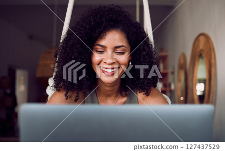 Coffee shop, working and face of black woman with laptop smiling, happy and excited to start project. Entrepreneur, freelancer and businesswoman typing, writing and reading work on computer in cafe 127437529