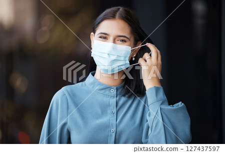 Woman, covid and face mask removing for end of pandemic, freedom in healthcare safety on mockup. Portrait of female taking off protective mask in relief for corona virus ending on bokeh background 127437597