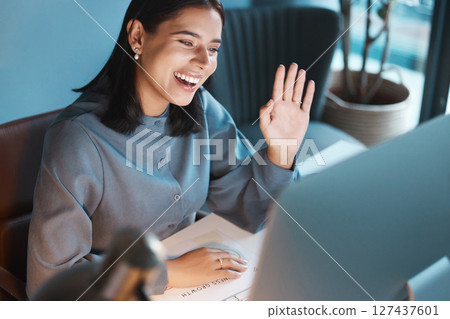 Video call, wave and computer with business woman in office for social networking, communication and webinar. Online meeting, technology and management with employee hello for virtual conference 127437601