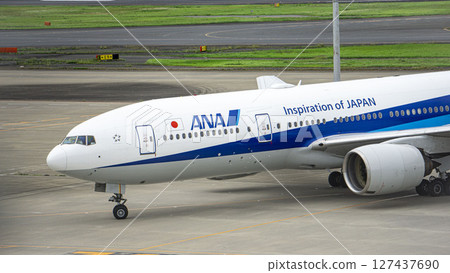 ANA plane taxiing at Haneda Airport ANA plane taxiing at Haneda Airport 127437690
