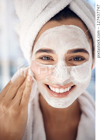 Face mask, skin care and woman in portrait or mirror for wellness, beauty and cosmetics cleaning product with smile. Facial wash, bathroom and young model with mask dermatology treatment at her home Face mask, skin care and woman in portrait or mirror for wellness, beauty and cosmetics cleaning product with smile. Facial wash, bathroom and young model with mask dermatology treatment at her home 127437747