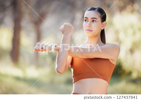 Stretching, fitness and nature woman for exercise, running and outdoor wellness with muscle power, energy and focus in park. Forest, woods and sports runner girl with goal for cardio health training Stretching, fitness and nature woman for exercise, running and outdoor wellness with muscle power, energy and focus in park. Forest, woods and sports runner girl with goal for cardio health training 127437841