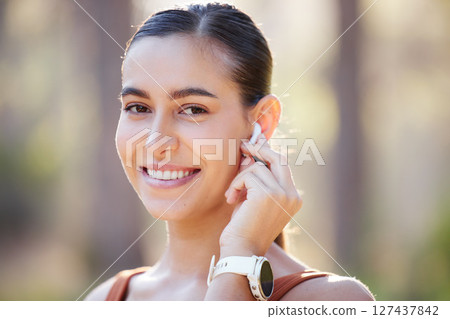 Fitness, woman and portrait smile for EarPods, music listening or wireless technology during running exercise. Active happy female smiling with teeth for earphones, healthy cardio and audio streaming 127437842