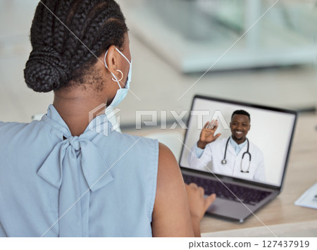 Covid, laptop and remote consultant with a doctor black man on a computer screen talking to a patient. Meeting, health and medicine with a woman on a video call with her male gp during corona virus Covid, laptop and remote consultant with a doctor black man on a computer screen talking to a patient. Meeting, health and medicine with a woman on a video call with her male gp during corona virus 127437919