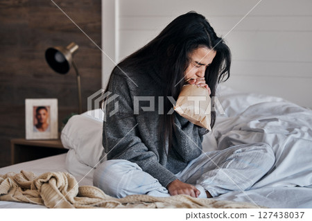 Woman, anxiety and paper bag stress breathing on bed in house or home bedroom in divorce crisis, marriage fail or widow grief. Mental health, panic attack and depression loss person in control breath Woman, anxiety and paper bag stress breathing on bed in house or home bedroom in divorce crisis, marriage fail or widow grief. Mental health, panic attack and depression loss person in control breath 127438037