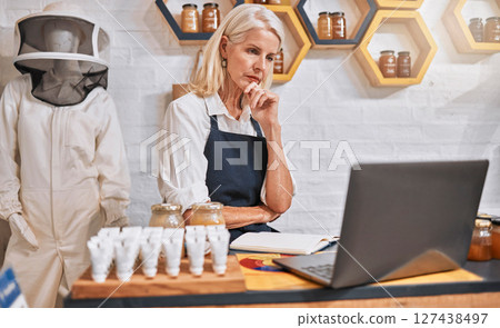 Shop, stress and anxiety of owner at laptop with inflation, debt or bankruptcy update. Fear, risk and bills of professional honey store manager checking finance report online with worry. Shop, stress and anxiety of owner at laptop with inflation, debt or bankruptcy update. Fear, risk and bills of professional honey store manager checking finance report online with worry. 127438497