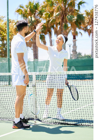 Sports, success and tennis team high five for court game, competition achievement or partnership teamwork support. Winner congratulations, target goals celebration and rival sportsmanship from player 127438776